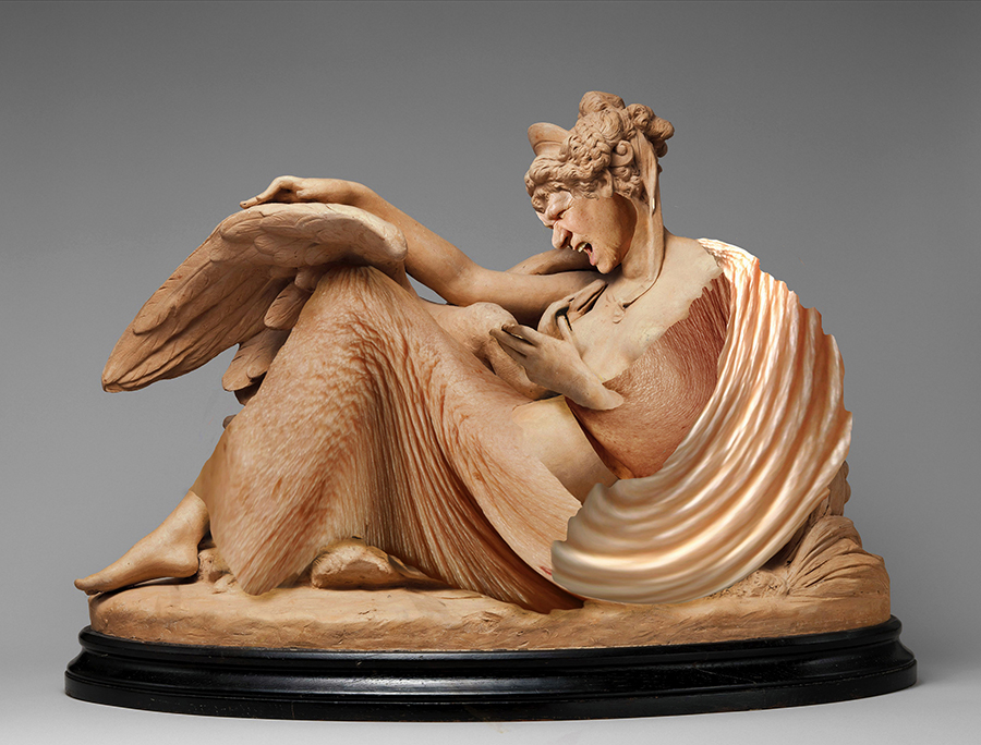 Sculpture of woman and a swan